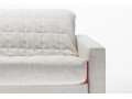 Canapé convertible BK 129 Modern, détail de l'accoudoir et du couvre-lit matelassé