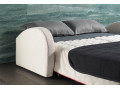 Canapé convertible BK 129 Vintage ouvert en lit double dans une chambre