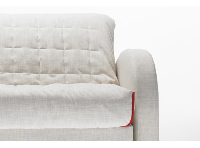 Canapé convertible BK 129 Vintage, détail de l'accoudoir galbé et du couvre-lit matelassé