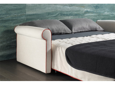 Canapé convertible BK 129 Classic ouvert en lit double dans une chambre